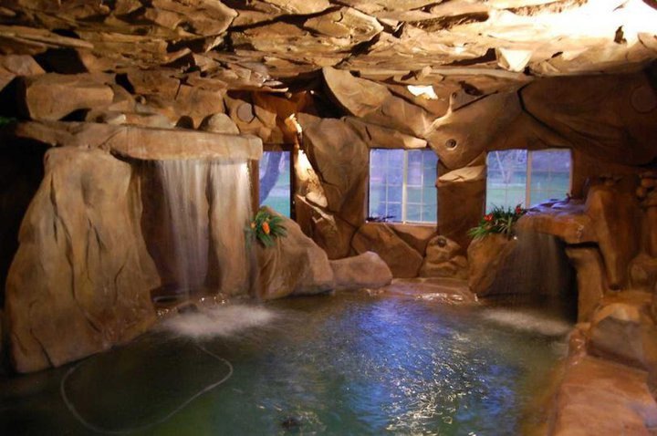 Custom faux rock interior water feature and pool area