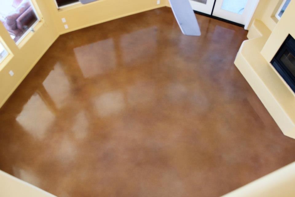 Large room with brown decorative concrete floor